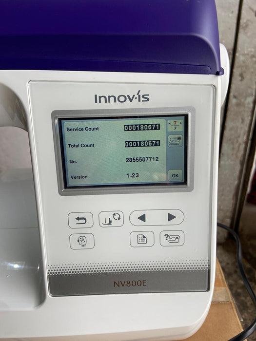 Innovis NV800E touchscreen control panel showing service count and total count 180671