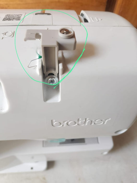 XF3368101 | THREAD GUIDE ASSY, Pre-tension thread guide setup. 