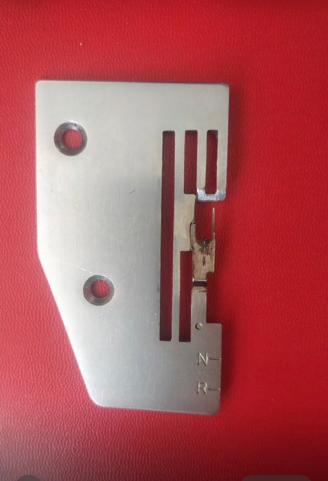 Juki Needle Plate Finger seen broken for a MO-50e, 50eN, 51eN Overlock Sewing Machine