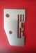 Juki Needle Plate Finger seen broken for a MO-50e, 50eN, 51eN Overlock Sewing Machine