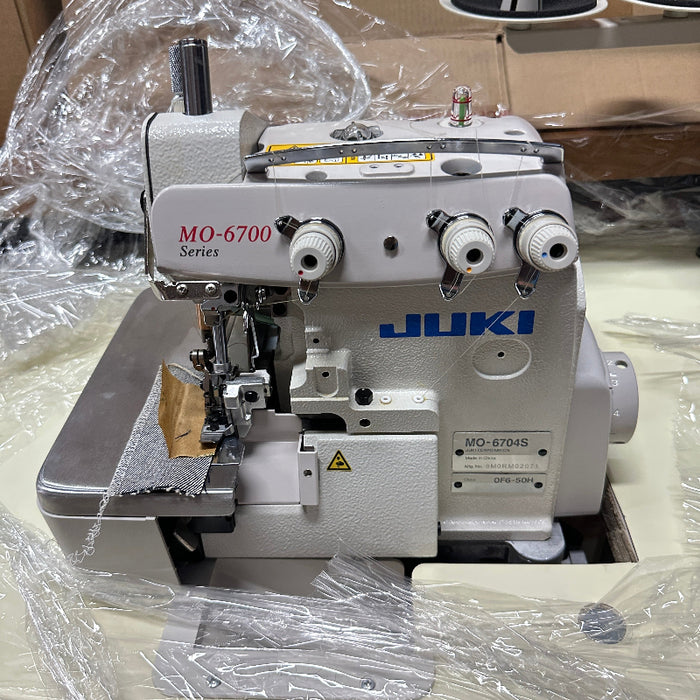 Juki MO-6700 Series overlock sewing machine. MO6704S 0F6 50H: 1 Needle(3 Threads) Overlock | 4.8mm 3 rolls | Medium-Heavy Running Stitch(Denims) | Extra High Throw