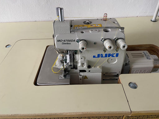JUKI MO-6704DA-0A4-150 in Sunken Table setup.