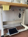 Single Needle Lockstitch, complete with Table, Stand with Direct Drive. Low cost, Value For Money sewing machine. The bottom view.
