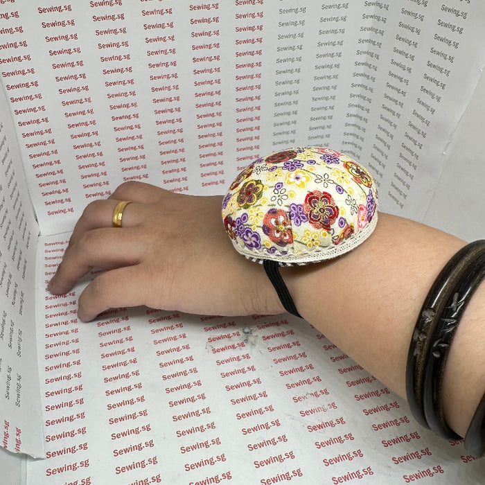 Pin Cushion With Elastic To Tie On Hand, Assorted Flower Print. Dia 6cm x 3cm Height, wear on hand.