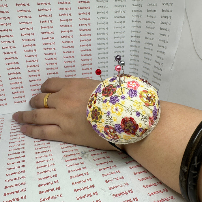 Pin Cushion With Elastic To Tie On Hand, Assorted Flower Print. Dia 6cm x 3cm Height, wear on hand, with 4 pieces of Pearl Pin.