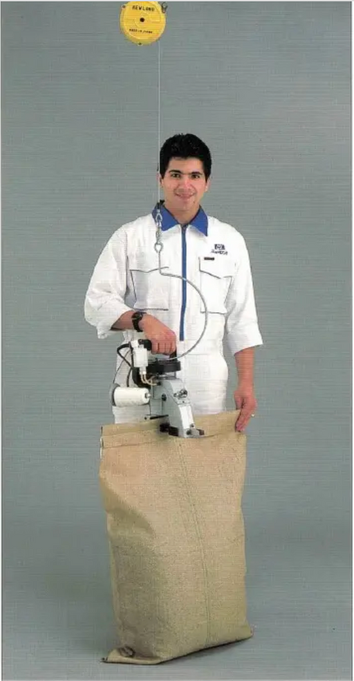 N600A-12V-BTN, Battery Operated Handheld Sewing Machine | Portable Bag Closer Machine in operational setup.